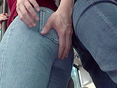 03H2223-Wife with a big butt being mischievous by a molester on the bus