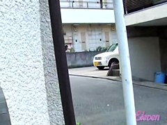 Adoring vivacious chick walking in the street while meeting some sharking guy