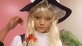 Amateur Girl in a Cosplay by Marisa Kirisame en Touhou Project