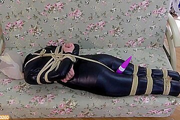 Asian Girl Hooded In Catsuit