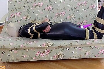 Asian Girl Hooded In Catsuit