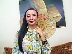 Asian MILF Creamed On Her Big Tits