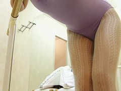 Asian ballet dancer changes and shows nudity on