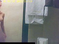 Asian woman secretly filmed in shower