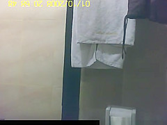 Asian woman secretly filmed in shower