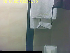 Asian woman secretly filmed in shower