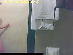 Asian woman secretly filmed in shower