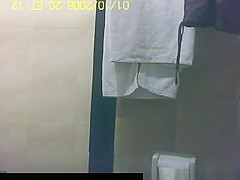 Asian woman secretly filmed in shower