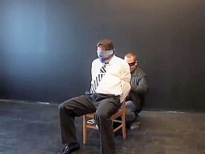 BG Hot beefy executive bound, gagged and stripped