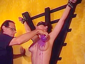 Big tits hottie Audrey ends up with hot wax over her tits in a BDSM session