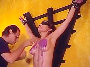 Big tits hottie Audrey ends up with hot wax over her tits in a BDSM session