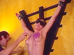 Big tits hottie Audrey ends up with hot wax over her tits in a BDSM session