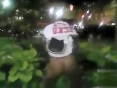Black mama exposes her big tits on the street