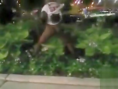 Black mama exposes her big tits on the street