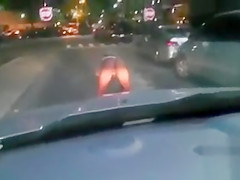Black mama exposes her big tits on the street
