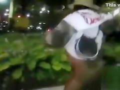 Black mama exposes her big tits on the street