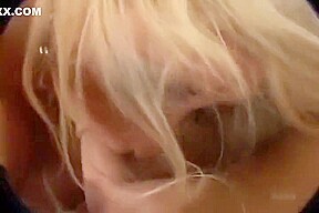 Blonde MILF with enormous tits handles two cocks at once