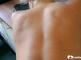 Blonde Milf with big boobs fucks a collegue in the kitchen