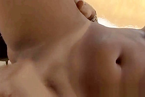Blonde shemale babe tugs on her hard cock outdoors