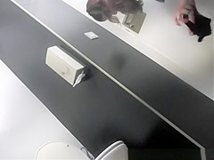 Brunette girl pulling down her bikini bottom and pissing