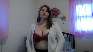 Busty girl smokes and gives a peak