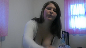 Busty girl smokes and gives a peak