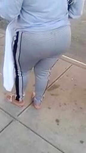 Candid booty milf waiting at bus stop