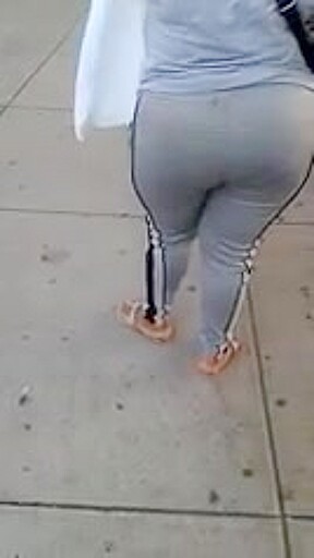 Candid booty milf waiting at bus stop