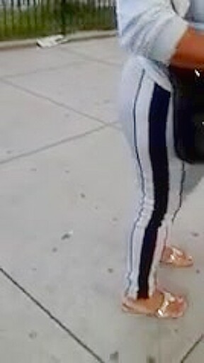 Candid booty milf waiting at bus stop