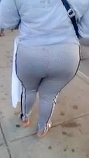 Candid booty milf waiting at bus stop