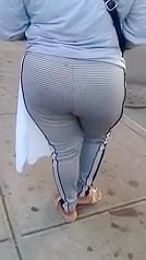Candid booty milf waiting at bus stop