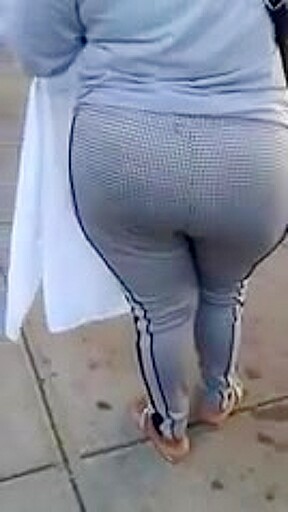 Candid booty milf waiting at bus stop
