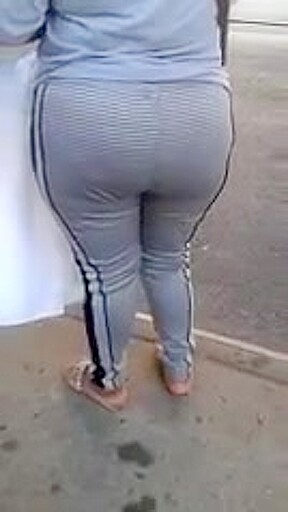 Candid booty milf waiting at bus stop