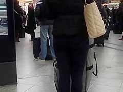 Candid street, shiny jacket and blue leggings