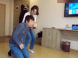 Chinese ballbust in tight jeans