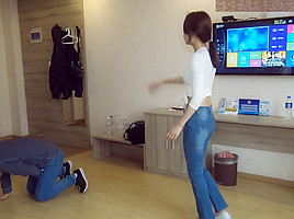 Chinese ballbust in tight jeans