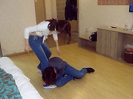 Chinese ballbust in tight jeans