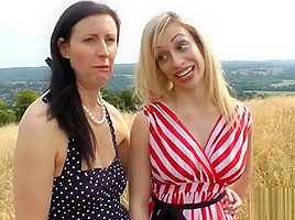 Classy milf fucked with strapon by busty babe