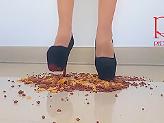 Cornfalkes Destroying With High Heels Boots On The Floor
