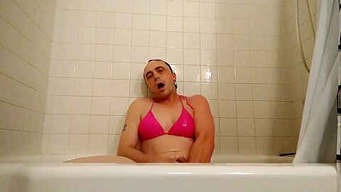 Crossdresser shoots load in shower butt plug