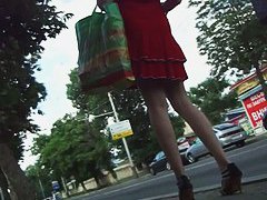 Cute brunette in red dress upskirt
