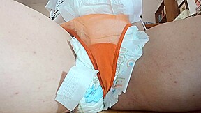 Diaper fetish pee session and whipping on pussy