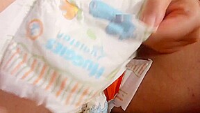 Diaper fetish pee session and whipping on pussy