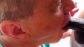 Fag sucks off a big black cock gets huge cum facial