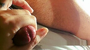 Fast slapping a tied cock