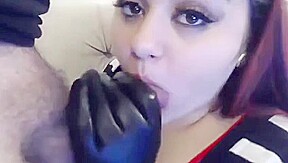 Gal in gloves milks a hard cock