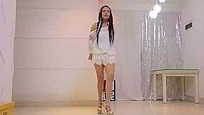 Girl in extremly short and transparent dress and high heels