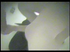 Girl in the pool changing room covers nudity under cloths