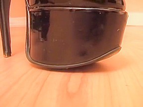 Goth giantess dominates tiny man with tits & boots