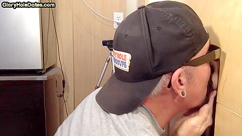 Gray DILF sucks and tugs gloryhole dick until spermed